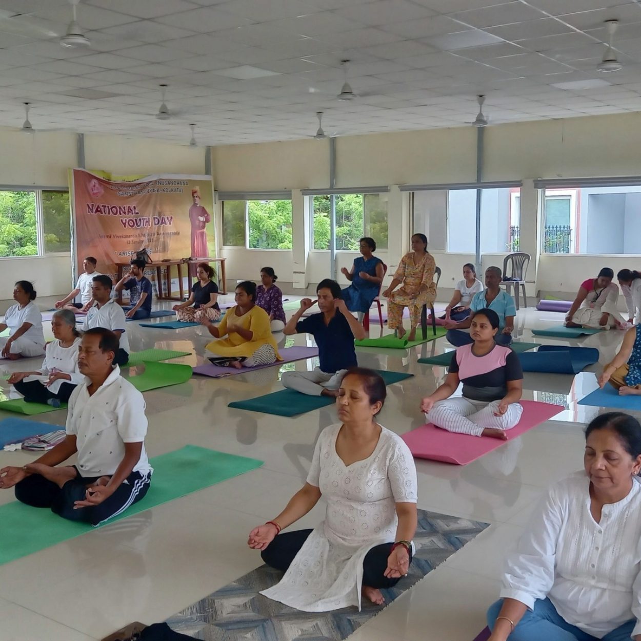 Group yoga session at VYASA, a yoga centre in Kolkata promoting wellness and mindfulness.
