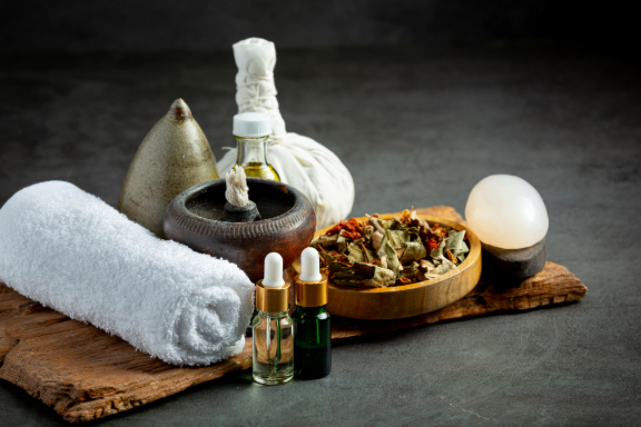 Herbal oils, natural ingredients, and spa essentials used for holistic therapies at a naturopathy center in Kolkata