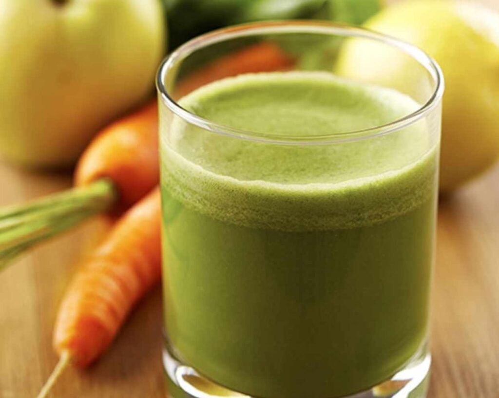 a glass full of juice to show the benefits of detox program over panchakarma therapy.