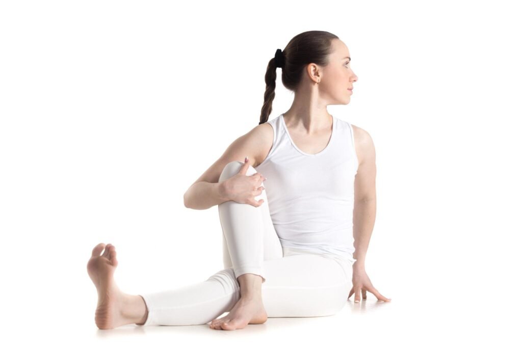 A woman is doing Yoga for Fatty Liver
